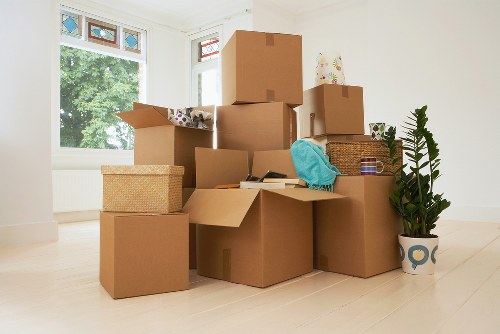 Packing boxes and furniture prepared for removals in Leabridge